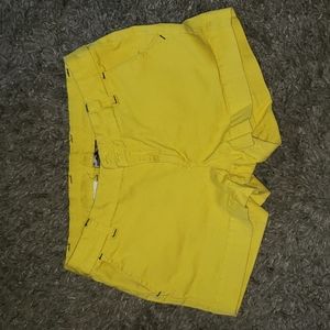 Bright yellow hiking shorts by Kavu. Size 10.